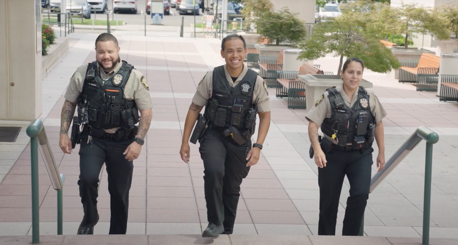 Officers walking up steps