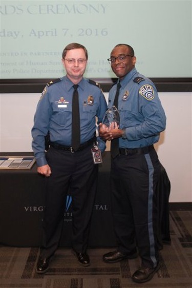 Photo with Police Department Intervention of the Year winner Darryl Wilson and Police Chief Jay Farr.