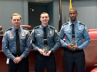 Photo with Police Chief Jay Farr (left) with CIT Officer Intervention of the Year award winners Corporal Chattillion and Officer Green