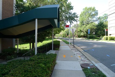 Southbound bus stop between I-395 ramp and South Lynn Street