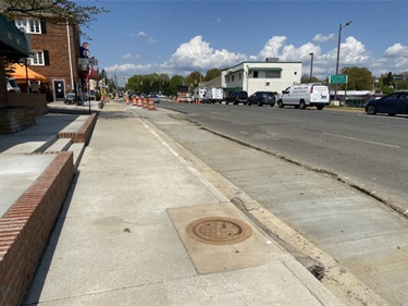 Contractor crews building a reinforced concrete base under the pavement of the curbside southbound Glebe Road travel lane (April 2021)