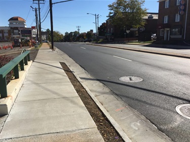 Restored sidewalk and newly paved Glebe Road