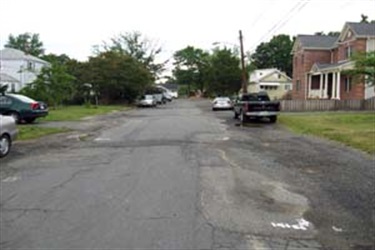 S. Oakland Street/Douglas Park – missing sidewalks, curbs, gutters