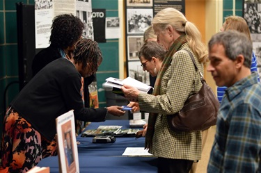 Audience members had the opportunity to view copies of the books written by Miller and Taylor. Photo by Blake Tippens