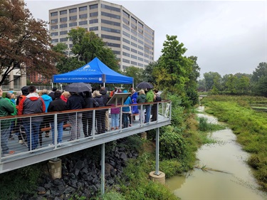 Crowd gathers at the ribbon cutting of the new Ballston Wetland Park