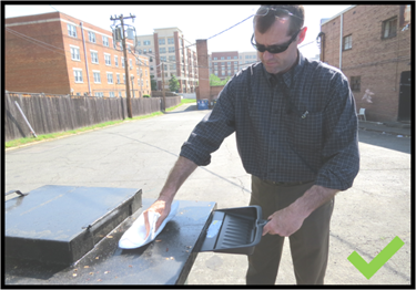 Cleaning a dumpster