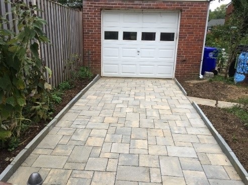 Completed driveway with permeable pavers.