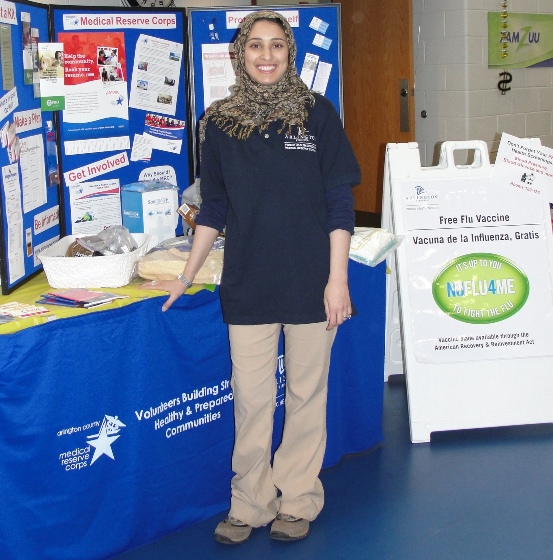 Person standing in front of Information Booth