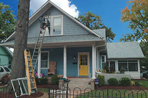 Historical home with ladder against roof