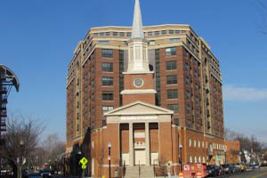 Front view of red brick multi storey building