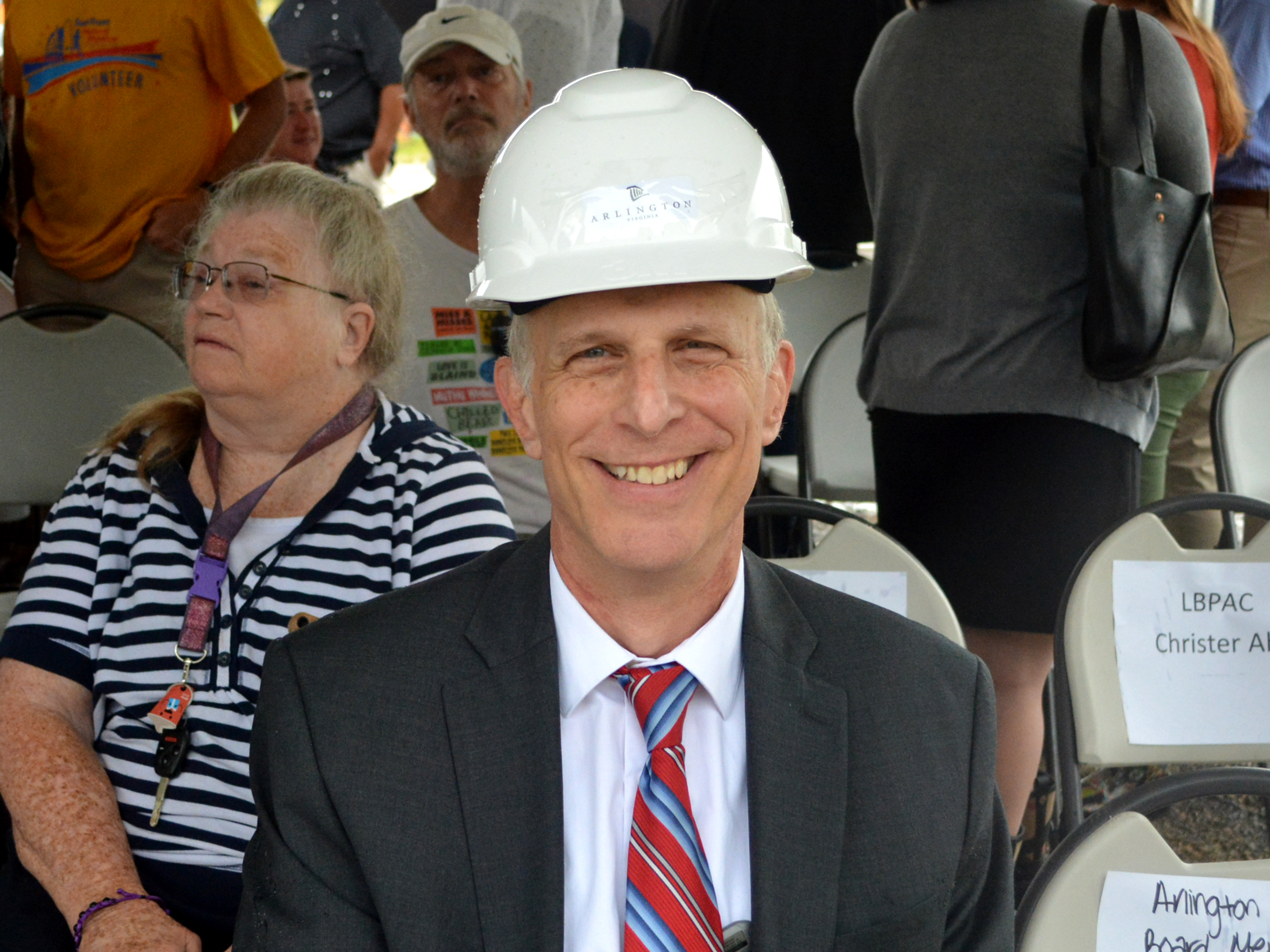 Smiling man wearing hard hat