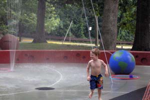 Child playing at Hayes Park Sprayground