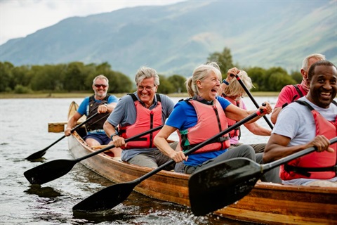 seniors in a boat rowing