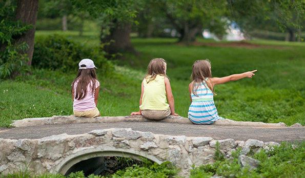 Group of three young girls in a park