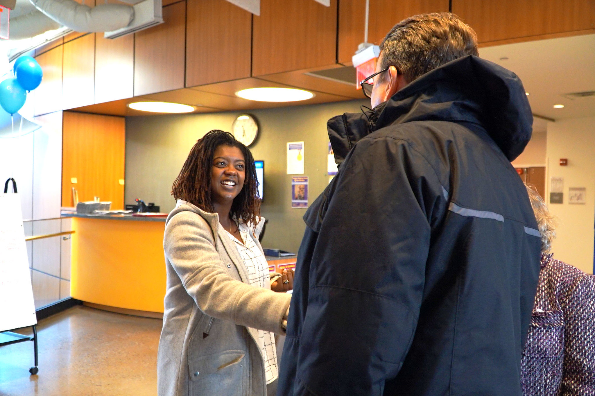 Two people shaking hands