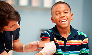 Young boy get a vaccination