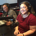 Two women with microphones and headphones