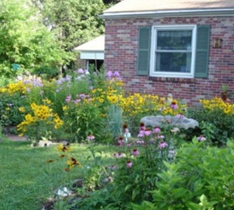 Conservation landscaping area showing the nearest structure in background