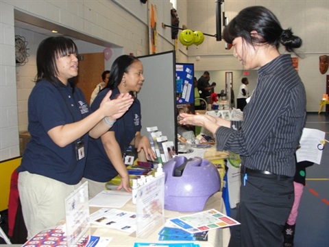 People at Information booth 