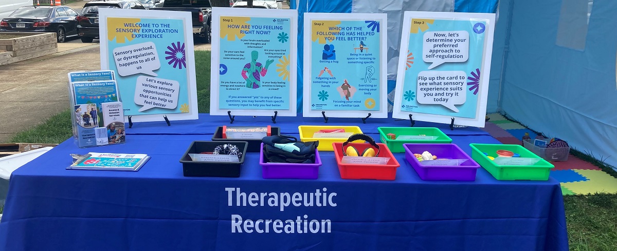 Table with various sensory items and a self guided sensory experience