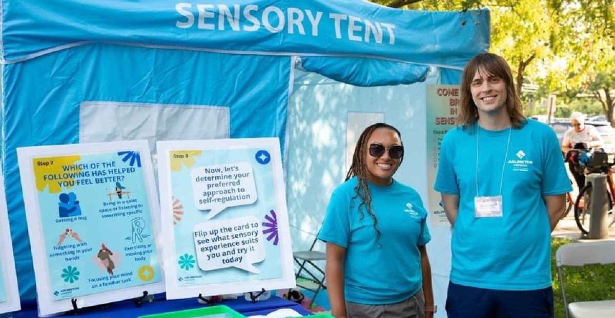 TR Staff standing in front of the Sensory Tent at the Arlington County Fair